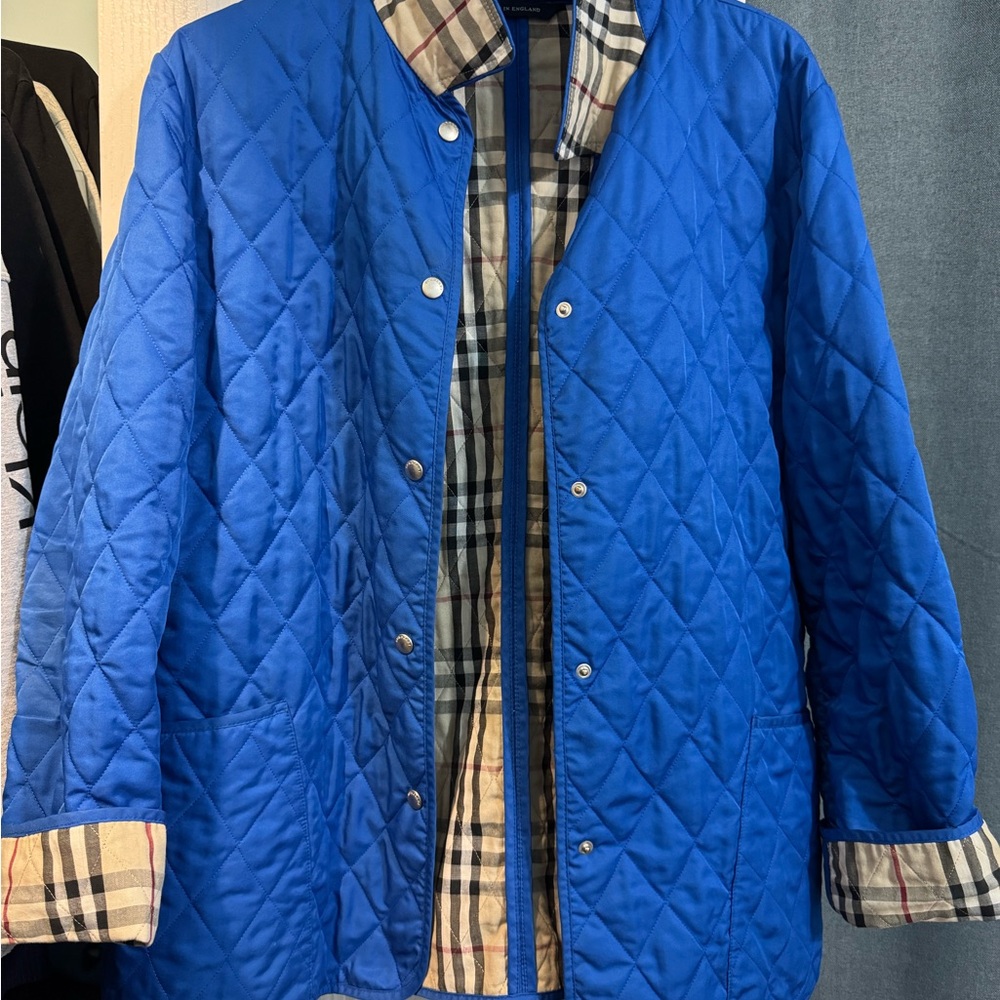 Burberry Blue Quilted Blazer with Plaid Lining in good used condition.Sz Large